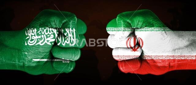 Kingdom Saudi Arabia and Iran Flag Painted on a Fists Pointing Towards Each Other. Country Conflicts Concept media background Kingdom Saudi Arabia and Iran Flag Painted on a Fists Pointing Towards Each Other. Country Conflicts Concept media background