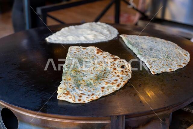 Saj pies or Saj Bakery or flat breads a type of street food in many Countries.