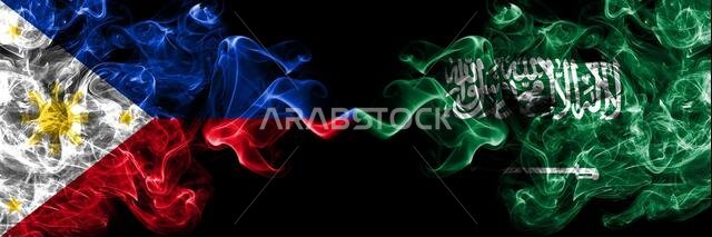 الفلبين، الفلبينية ضد السعودية، أعلام دخان عربية جنباً إلى جنب. الفلبين، الفلبينية ضد السعودية، أعلام دخان عربية جنباً إلى جنب.