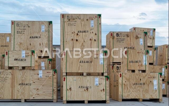 Houston, Texas USA 12-08-2019: Wooden crates for Aramco company stacked up and ready for transport. Saudi Arabian oil company.