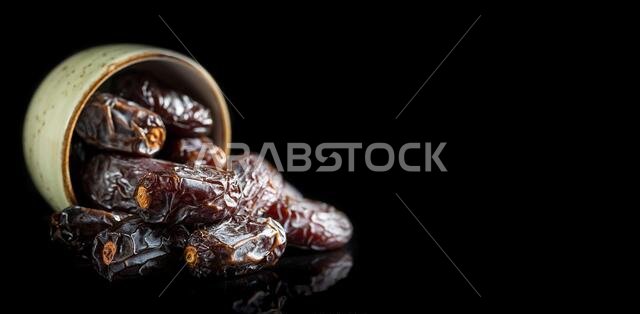 Dates fruit and rosary still life against on white background. Ramadan background greeting card. Ramadan Kareem. Traditional culture of the Middle Eas