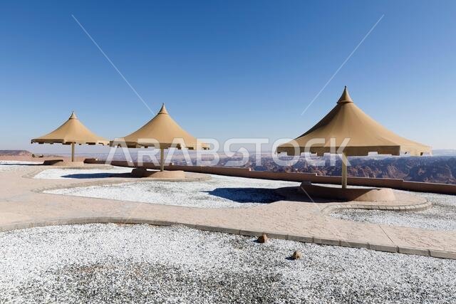 Park with a parasol near Al Ula. From the lookout point you have a beautiful view down into the valley, Saudi Arabia