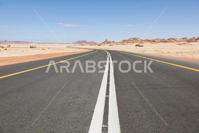 Typical road in Saudi Arabia that leads through the desert