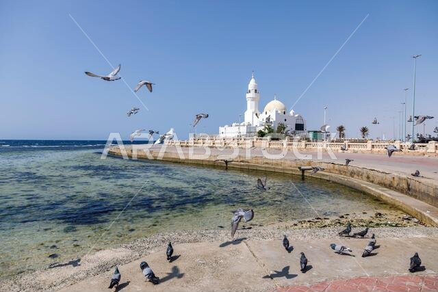 Small white mosque built on the Corniche right on the shores of the Red Sea in Jeddah, Saudi Arabia