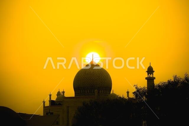 masjid minarets against sky background