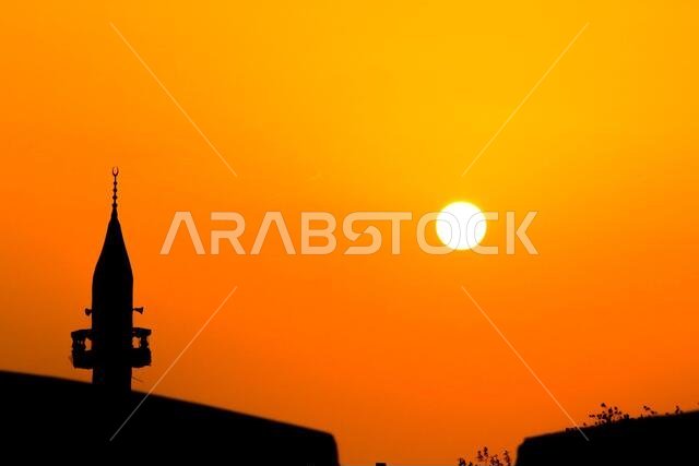 masjid minarets against sky background