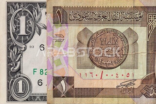 أوراق نقدية قديمة من فئة ريال سعودي واحد ودولار أمريكي واحد لأغراض التصميم أوراق نقدية قديمة من فئة ريال سعودي واحد ودولار أمريكي واحد لأغراض التصميم