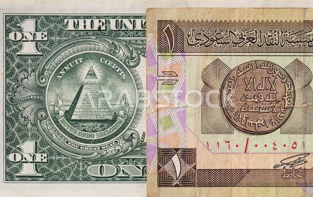 أوراق نقدية قديمة من فئة ريال سعودي واحد ودولار أمريكي واحد لأغراض التصميم