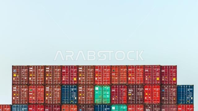 Shipping containers stacked on cargo Ship sailing through Suez Canal, Egypt. 26-March-2021.