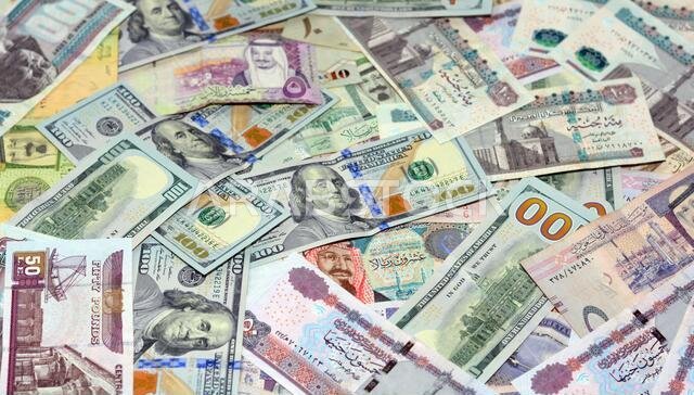 Saudi Arabia currency with USA currency and Egypt currency banknotes . Saudi Arabia riyals, Egyptian pounds and American dollars exchange rate