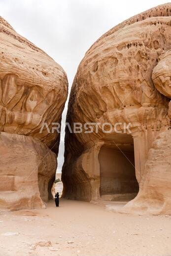 Al Ula, Saudi Arabia, February 19 2020: Tourist inside the Siq of Jabal Ithlib in Al Ula, KSA