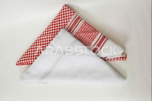 Arabic traditional head dress accessories Shemagh and white Ghutrah with grey background