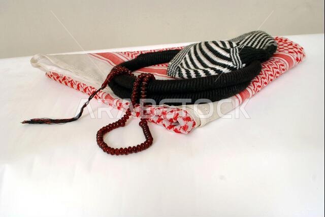 Arabic cultural traditional clothing accessories specially famous dressing of middle east and gulf contries,A set of agal ,shemag, Islamic rosary,cap
