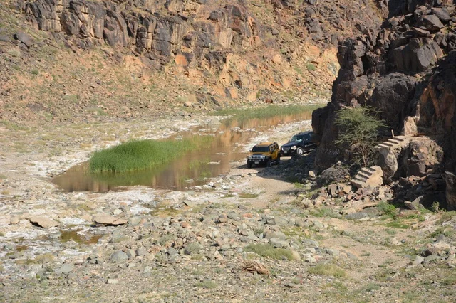 Off Road Vehicles in Saudi Arabia Desert Canyon Valley