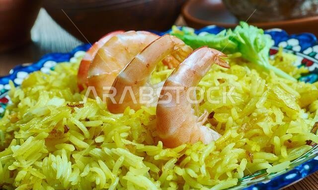 Mumawwash classic dish from Kuwait combines rice topped with dry shrimp.