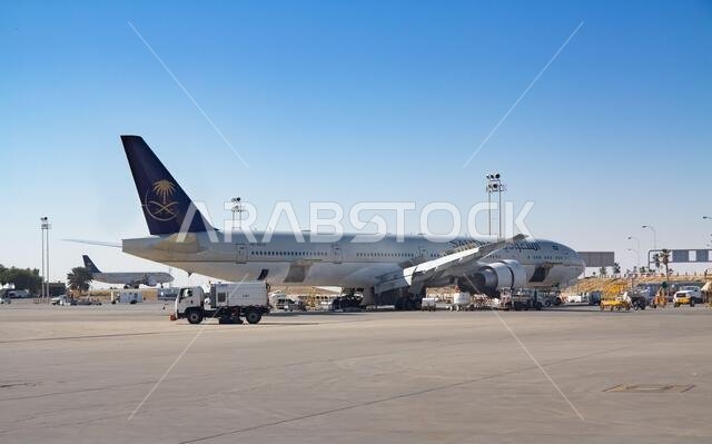 Riyadh - March 01:  Planes preparing for take off at Riyadh King Khalid Airport on March 01, 2016 in Riyadh, Saudi Arabia. Riyadh airport is home port