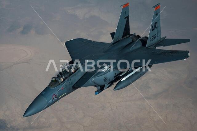 Persian Gulf, Saudi Arabia. 27th Jan, 2021. A U.S. Air Force F-15E Strike Eagle fighter aircraft breaks off after refueling from a KC-135 Stratotanker during a short-duration deployment to the middle east January 27, 202 over the Persian Gulf. The fighter is escorting B-52 Stratofortress strategic bombers from the 2nd Bomb Wing. Credit: Planetpix/Alamy Live News