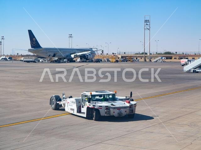 Riyadh - March 01:  Planes preparing for take off at Riyadh King Khalid Airport on March 01, 2016 in Riyadh, Saudi Arabia. Riyadh airport is home port