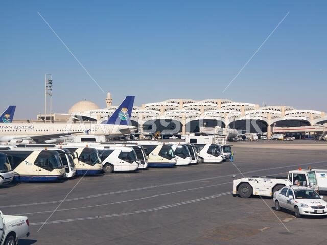 Riyadh - March 01:  Planes preparing for take off at Riyadh King Khalid Airport on March 01, 2016 in Riyadh, Saudi Arabia. Riyadh airport is home port