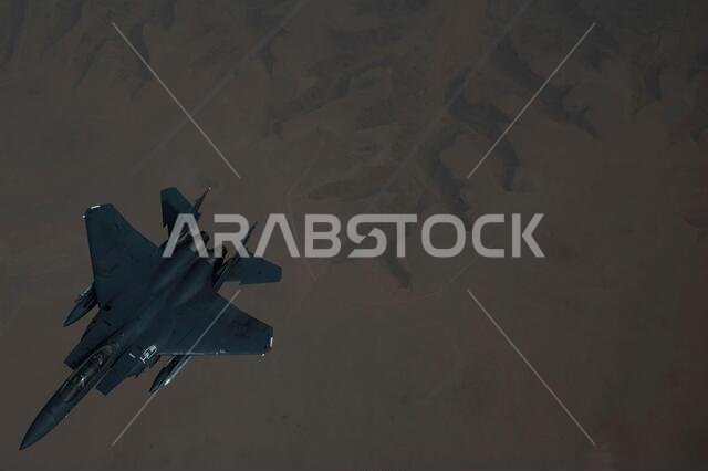 Persian Gulf, Saudi Arabia. 27th Jan, 2021. A U.S. Air Force F-15E Strike Eagle fighter aircraft breaks off after refueling from a KC-135 Stratotanker during a short-duration deployment to the middle east January 27, 202 over the Persian Gulf. The fighter is escorting B-52 Stratofortress strategic bombers from the 2nd Bomb Wing. Credit: Planetpix/Alamy Live News