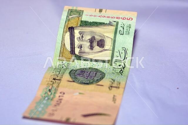 Saudi Arabian Kingdom currency portrait, one Saudi Riyal banknote money, Saudi money portrait with king Abdullah photo on the 1 riyal banknote on it