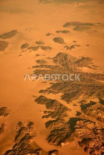 Desert in the south-middle area of Saudi Arabia from the air Desert in the south-middle area of Saudi Arabia from the air