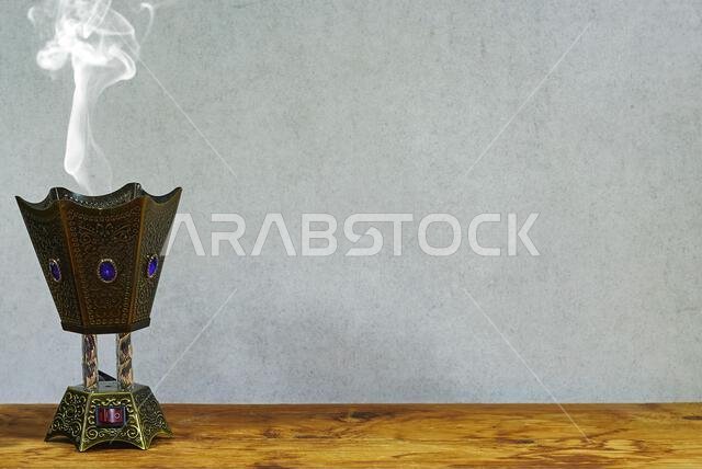 censer incense burner on wood table for ramadan and eid El fitr