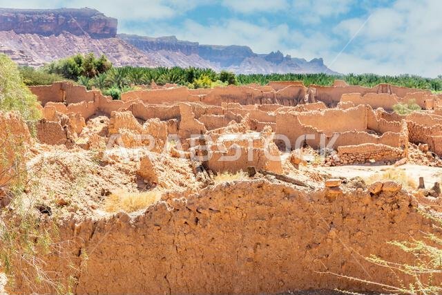 Al Ula ruined ancient town houses ruins with rocky landscape in the background, Saudi Arabia