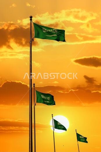 Saudi Arabia national flag waving at sunset. Islamic religion flag.