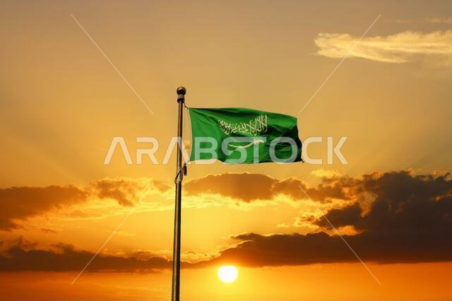 Saudi Arabia national flag waving at sunset. Islamic religion flag.