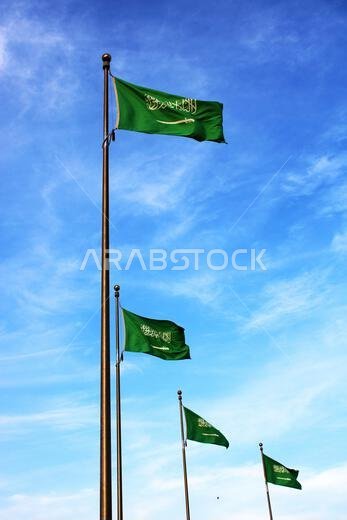 Saudi Arabia national flag waving in the sky. Islamic religion flag.