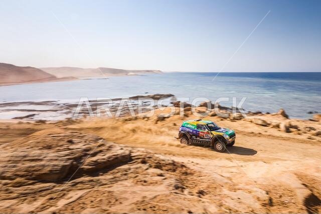 Neom, Saudi Arabia. 12th Jan, 2021. 335 Spinelli Guilherme (bra), Haddad Youssef (bra), Mini, X-Raid Mini JCW Rally Team, Auto, action during the 9th stage of the Dakar 2021 between Neom and Neom, in Saudi Arabia on January 12, 2021 - Photo Antonin Vincent/DPPI/LM Credit: Gruppo Editoriale LiveMedia/Alamy Live News