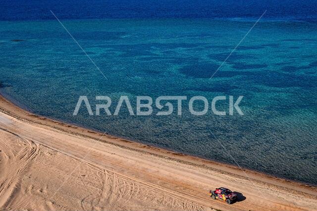 نيوم، المملكة العربية السعودية. ١٢ يناير ٢٠٢١. #٣٠٧ برزيغونسكي جاكوب (بولندي)، غوتشالك تيمو (ألماني)، تويوتا، أوفر درايف تويوتا، سيارة، خلال المرحلة التاسعة من رالي داكار ٢٠٢١ بين نيوم ونيوم، في المملكة العربية السعودية بتاريخ ١٢ يناير ٢٠٢١ - صورة إريك فارغيولو/DPPI/LM. حقوق الصورة: Gruppo Editoriale LiveMedia/Alamy Live News نيوم، المملكة العربية السعودية. ١٢ يناير ٢٠٢١. #٣٠٧ برزيغونسكي جاكوب (بولندي)، غوتشالك تيمو (ألماني)، تويوتا، أوفر درايف تويوتا، سيارة، خلال المرحلة التاسعة من رالي داكار ٢٠٢١ بين نيوم ونيوم، في المملكة العربية السعودية بتاريخ ١٢ يناير ٢٠٢١ - صورة إريك فارغيولو/DPPI/LM. حقوق الصورة: Gruppo Editoriale LiveMedia/Alamy Live News
