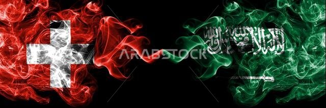Switzerland, Swiss vs Saudi Arabia, Arabian smoky mystic flags placed side by side. Thick colored silky abstract smoke flags. Switzerland, Swiss vs Saudi Arabia, Arabian smoky mystic flags placed side by side. Thick colored silky abstract smoke flags.
