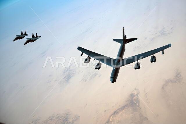 Saudi Arabia, Saudi Arabia. 07th Jan, 2021. A U.S. Air Force B-52 Stratofortress strategic bomber aircraft is escorted by Royal Saudi Arabian Air Force F-15S/A fighter aircraft as they fly over Saudi airspace January 7, 2021 in Saudi Arabia. The bomber and escort is a show of force mission as a message to Iran. Credit: Planetpix/Alamy Live News Saudi Arabia, Saudi Arabia. 07th Jan, 2021. A U.S. Air Force B-52 Stratofortress strategic bomber aircraft is escorted by Royal Saudi Arabian Air Force F-15S/A fighter aircraft as they fly over Saudi airspace January 7, 2021 in Saudi Arabia. The bomber and escort is a show of force mission as a message to Iran. Credit: Planetpix/Alamy Live News