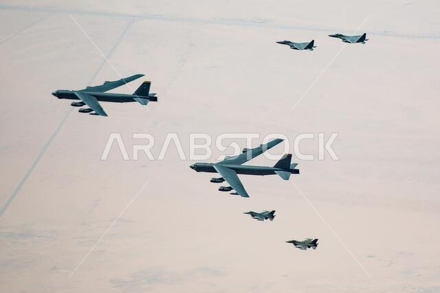Saudi Arabia, Saudi Arabia. 07th Jan, 2021. U.S. Air Force B-52 Stratofortress strategic bomber aircraft are escorted by Royal Saudi Arabian Air Force F-15S/A fighters, right, and U.S. Air Force F-16 Fighting Falcons as they fly over Saudi airspace January 7, 2021 in Saudi Arabia. The bomber and escort is a show of force mission as a message to Iran. Credit: Planetpix/Alamy Live News Saudi Arabia, Saudi Arabia. 07th Jan, 2021. U.S. Air Force B-52 Stratofortress strategic bomber aircraft are escorted by Royal Saudi Arabian Air Force F-15S/A fighters, right, and U.S. Air Force F-16 Fighting Falcons as they fly over Saudi airspace January 7, 2021 in Saudi Arabia. The bomber and escort is a show of force mission as a message to Iran. Credit: Planetpix/Alamy Live News
