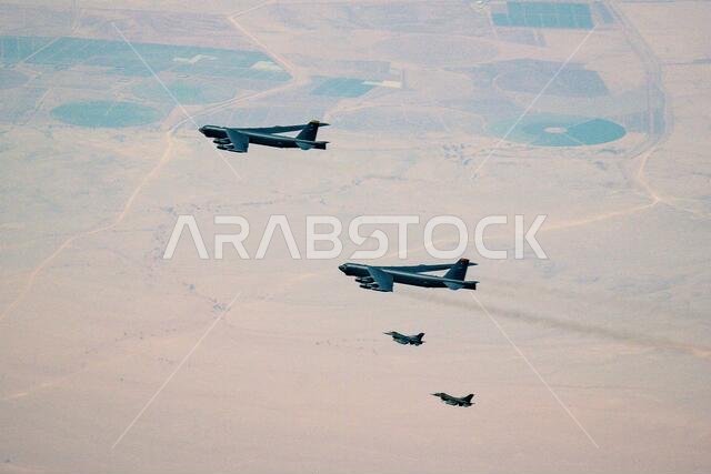 Saudi Arabia, Saudi Arabia. 09th Jan, 2021. U.S. Air Force B-52 Stratofortress strategic bomber aircraft are escorted by U.S. Air Force F-16 Fighting Falcon fighter jets as they fly over Saudi airspace January 7, 2021 in Saudi Arabia. The bomber and escort is a show of force mission as a message to Iran. Credit: Planetpix/Alamy Live News Saudi Arabia, Saudi Arabia. 09th Jan, 2021. U.S. Air Force B-52 Stratofortress strategic bomber aircraft are escorted by U.S. Air Force F-16 Fighting Falcon fighter jets as they fly over Saudi airspace January 7, 2021 in Saudi Arabia. The bomber and escort is a show of force mission as a message to Iran. Credit: Planetpix/Alamy Live News