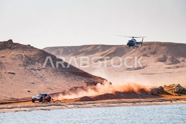 Neom, Saudi Arabia. 12th Jan, 2021. 310 Al Qassimi Sheikh Khalid (are), Panseri Xavier (fra), Peugeot, PH Sport, Abu Dhabi Racing, Auto, action during the 9th stage of the Dakar 2021 between Neom and Neom, in Saudi Arabia on January 12, 2021 - Photo Antonin Vincent/DPPI/LM Credit: Gruppo Editoriale LiveMedia/Alamy Live News
