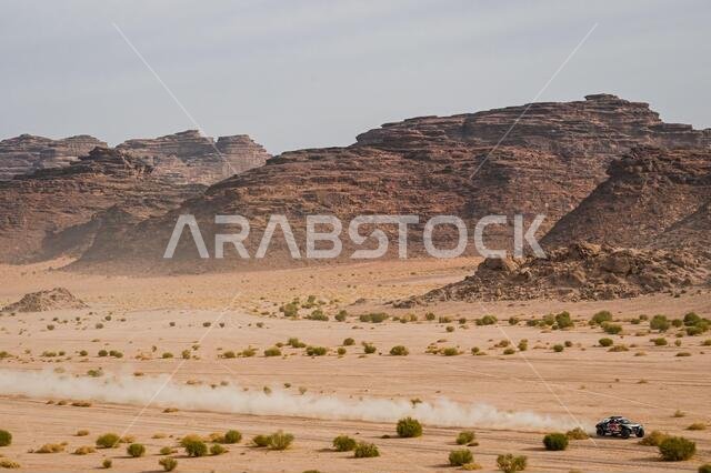العلا، المملكة العربية السعودية. ١٣ يناير ٢٠٢١. #٣٠٢ بيترهانسل ستيفان (فرنسا)، بولانجر إدوارد (فرنسا)، ميني، فريق إكس-ريد ميني جيه سي كيو، سيارة، خلال المرحلة العاشرة من رالي داكار ٢٠٢١ بين نيوم والعلا، في المملكة العربية السعودية بتاريخ ١٣ يناير ٢٠٢١ - صورة إريك فارجيولو/DPPI/LM. حقوق الصورة: Gruppo Editoriale LiveMedia/Alamy Live News