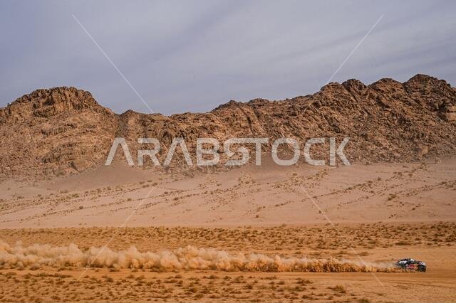العلا، المملكة العربية السعودية. ١٣ يناير ٢٠٢١. #٣٠٢ بيترهانسل ستيفان (فرنسا)، بولانجر إدوارد (فرنسا)، ميني، فريق إكس-ريد ميني جيه سي كيو، سيارة، خلال المرحلة العاشرة من رالي داكار ٢٠٢١ بين نيوم والعلا، في المملكة العربية السعودية بتاريخ ١٣ يناير ٢٠٢١ - صورة إريك فارجيولو/DPPI/LM. حقوق الصورة: Gruppo Editoriale LiveMedia/Alamy Live News