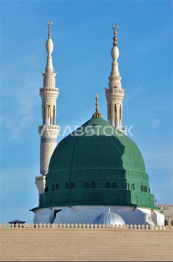 MADINAH, SAUDI ARABIA - Nov 29, 2019: view of the green dome of the Nabawi mosque