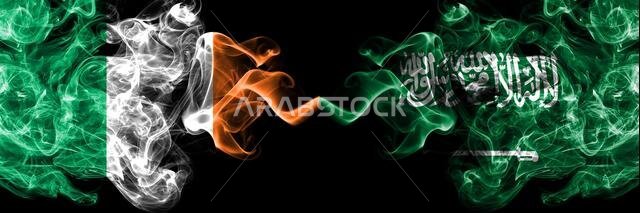Republic of Ireland, Irish vs Saudi Arabia, Arabian smoky mystic flags placed side by side. Thick colored silky abstract smoke flags.