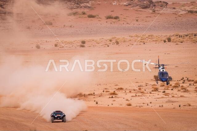 Al Ula, Saudi Arabia. 13th Jan, 2021. 319 Pelichet Jerome (fra), Larroque Pascal (fra), Optimus, Raidlynx, Motul, Auto, action during the 10th stage of the Dakar 2021 between Neom and Al-?Ula, in Saudi Arabia on January 13, 2021 - Photo Frederic Le Floc'h/DPPI/LM Credit: Gruppo Editoriale LiveMedia/Alamy Live News