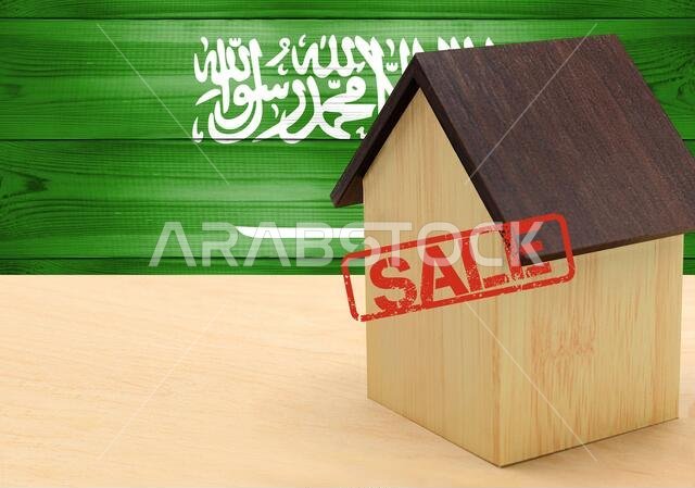 The concept sale of apartments, of real estate mortgages, citizenship and accommodation, as well as investment in a future home. Saudi Arabia flag on The concept sale of apartments, of real estate mortgages, citizenship and accommodation, as well as investment in a future home. Saudi Arabia flag on