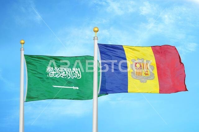 Saudi Arabia and Andorra two flags on flagpoles and blue cloudy sky