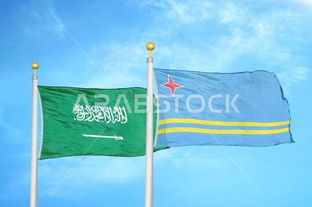 Saudi Arabia and Aruba two flags on flagpoles and blue cloudy sky