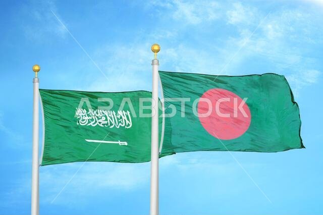Saudi Arabia and Bangladesh two flags on flagpoles and blue cloudy sky