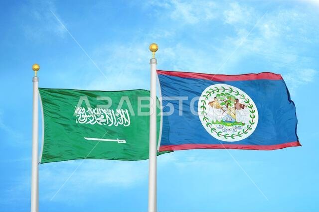 Saudi Arabia and Belize two flags on flagpoles and blue cloudy sky