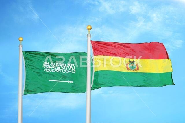 المملكة العربية السعودية وبوليفيا، علمان على ساريتين وسماء زرقاء ملبدة بالغيوم