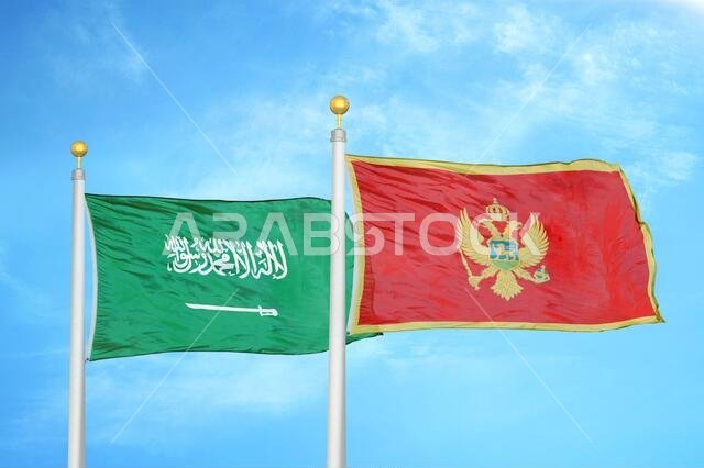 Saudi Arabia and Montenegro two flags on flagpoles and blue cloudy sky